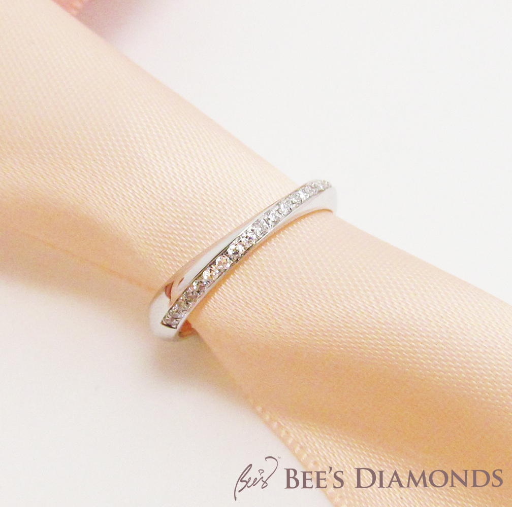 Mobius style diamond wedding ring